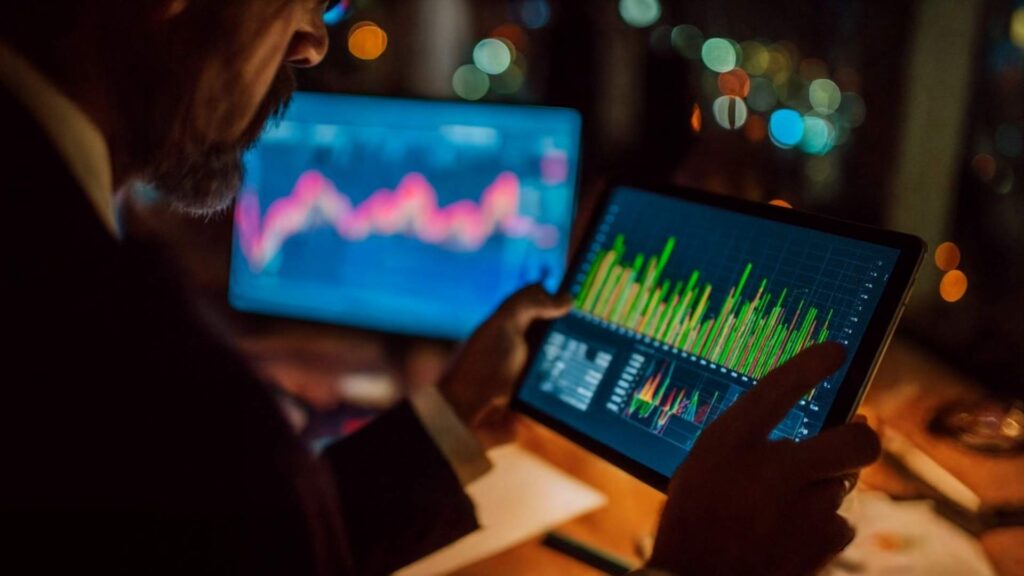 investor reviewing his investment porfolio performance