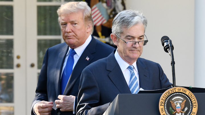 President Donald Trump behind Fed Chair Jerome Powell.